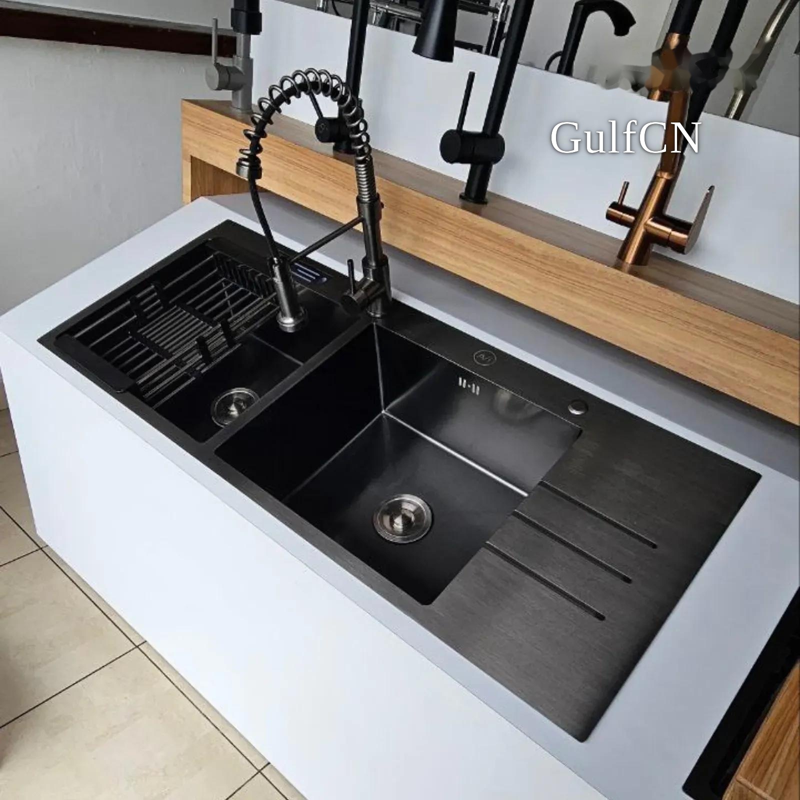 Black double kitchen sink and faucet range at a Chinese exhibition
