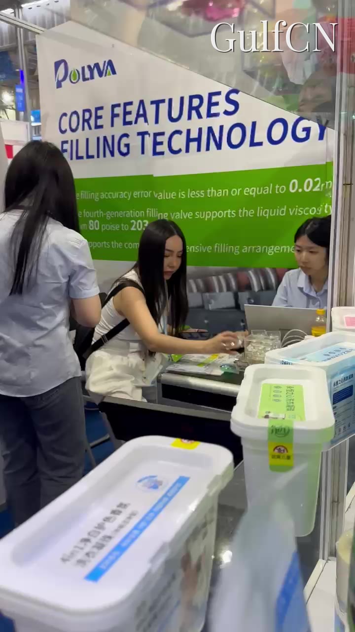 China trade-fair stand, team checking multi-chamber pod samples for a Dubai manufacturer